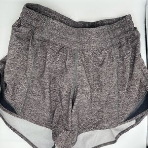 Lululemon Hotty Hot Shorts. 4 inch. Size 6. Color: Heather Lux Multi Black.